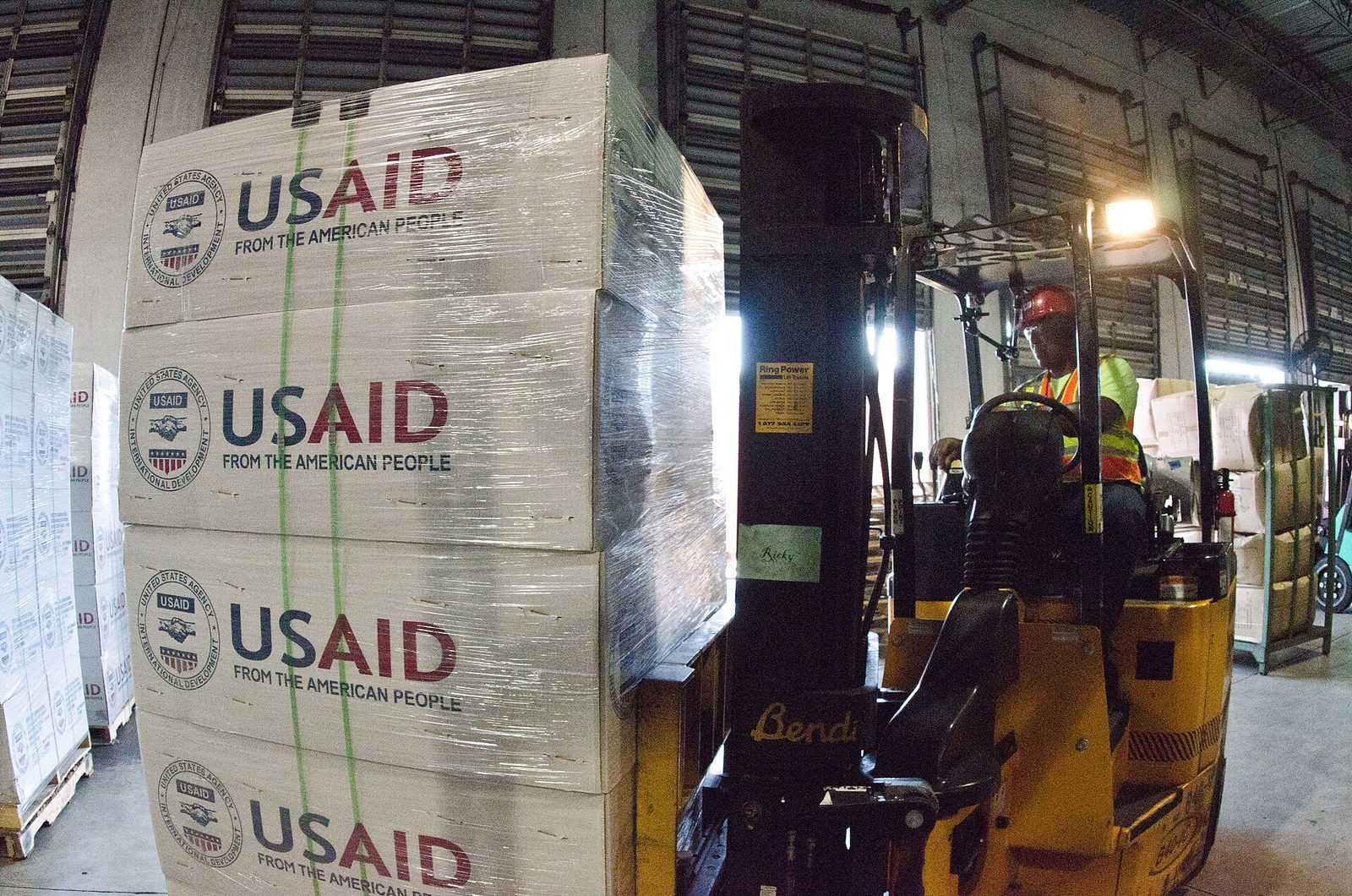Forklift operator in warehouse